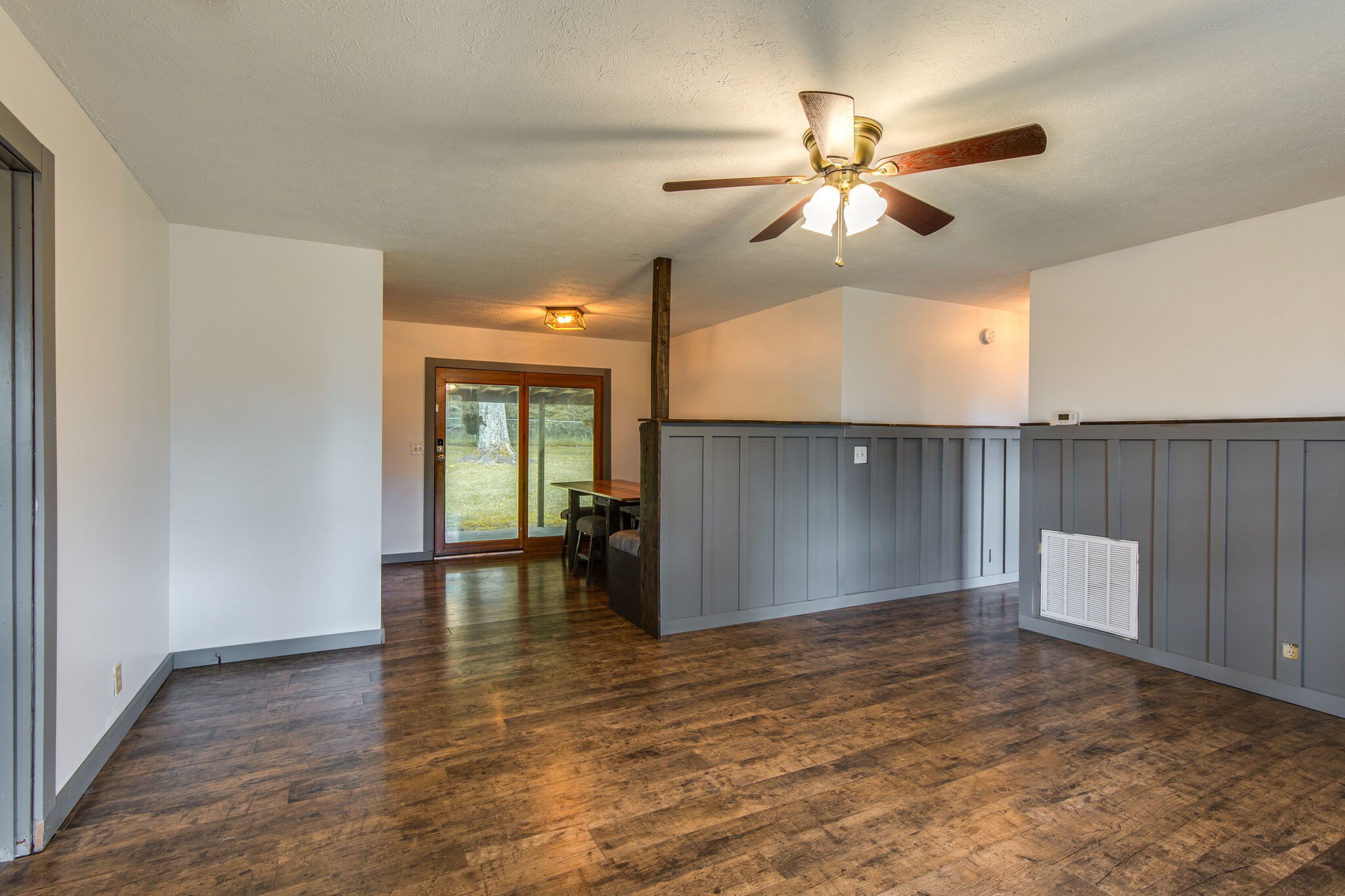 1022 Garton Road Burns, TN 37029 - Photo 4 of 23 a view of empty room with wooden floor and fan