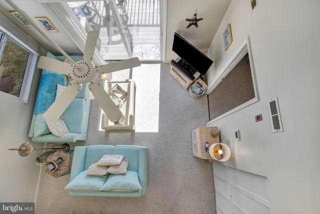 a bedroom with two beds and painted walls