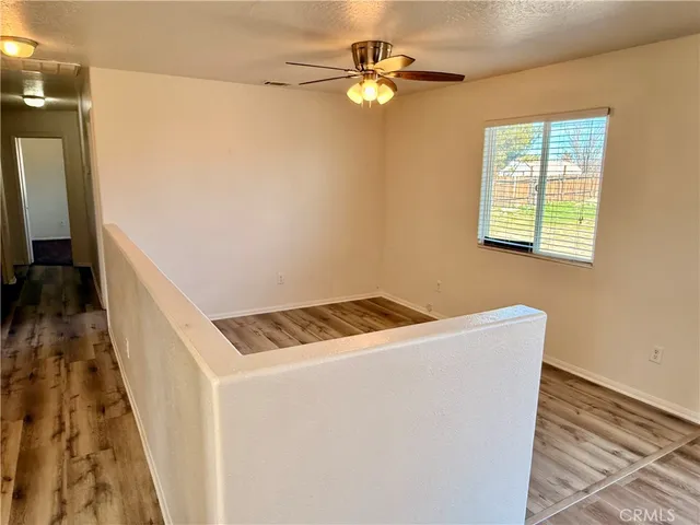 a kitchen with stove a sink and refrigerator