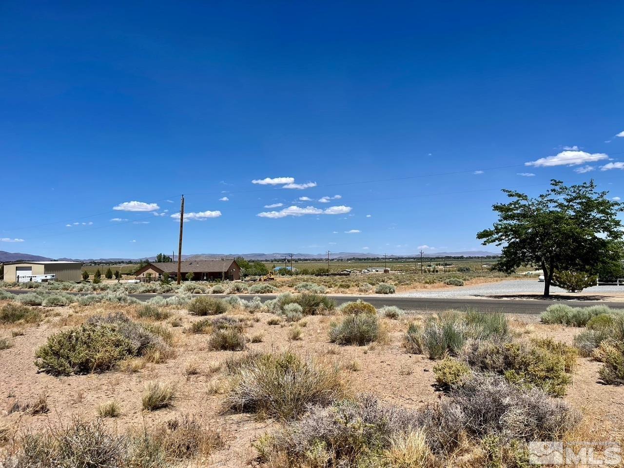 0 Locust Yerington, NV 89447 - Photo 3 of 6 a view of a lake with a beach
