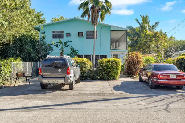 a car parked in front of a house