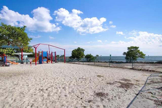 a view of a chairs and table in a patio