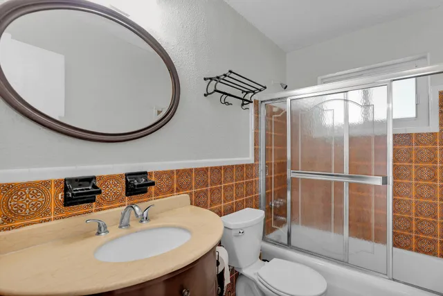 a kitchen with stainless steel appliances a refrigerator and a sink