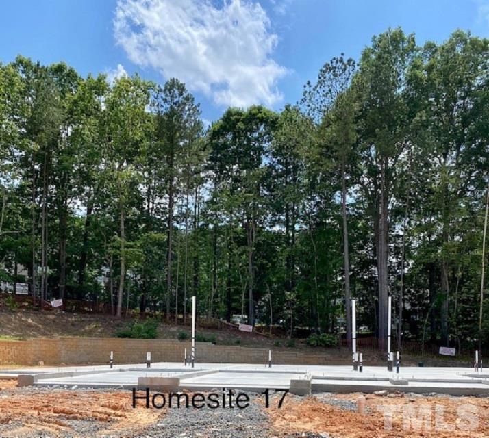 3827 Milltown Ridge Run Raleigh, NC 27612 - Photo 13 of 16 front view of a house with a yard