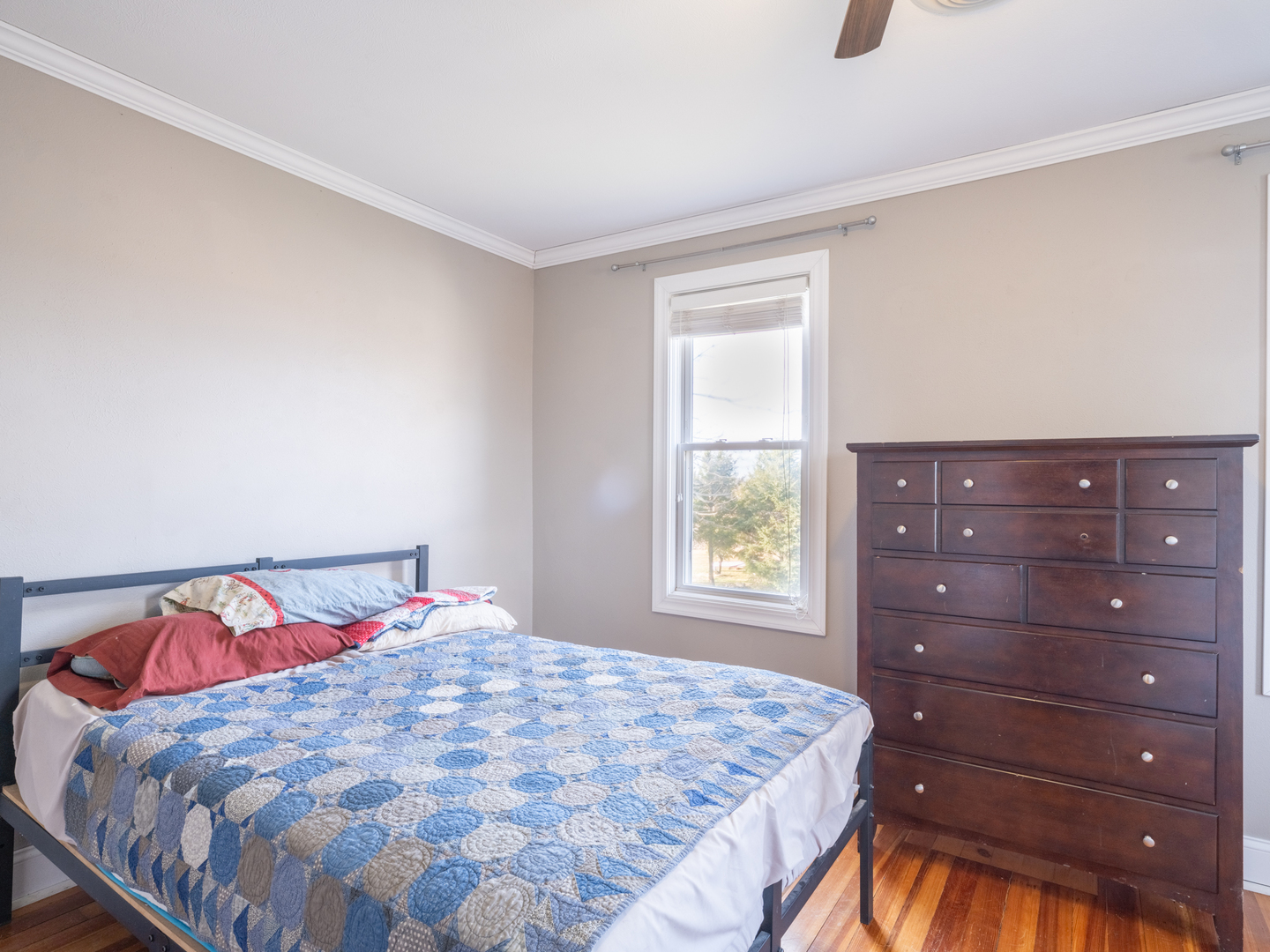 5631 Broadway Road Groveland, IL 61535 - Photo 12 of 41 a bedroom with a bed and a window