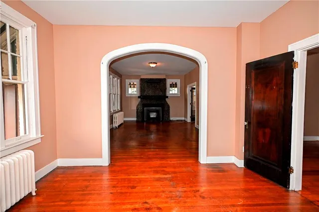 a view of livingroom with furniture wooden floor and windows