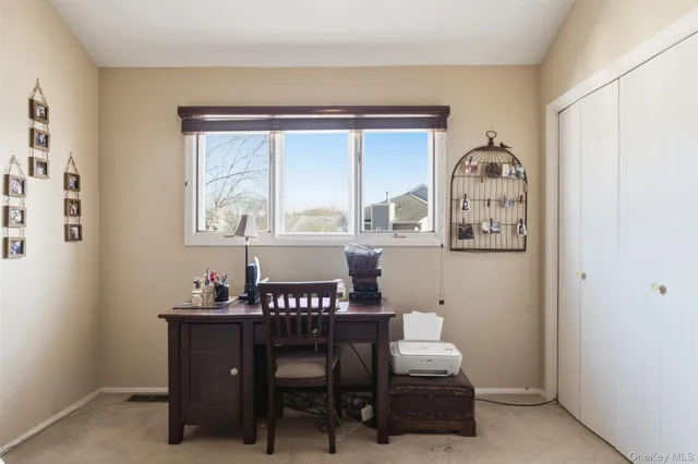 a view of a dining room with furniture window and outside view