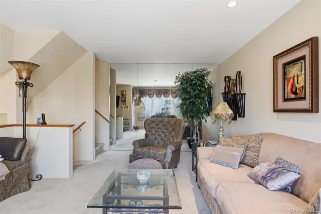 a living room with furniture and a couch