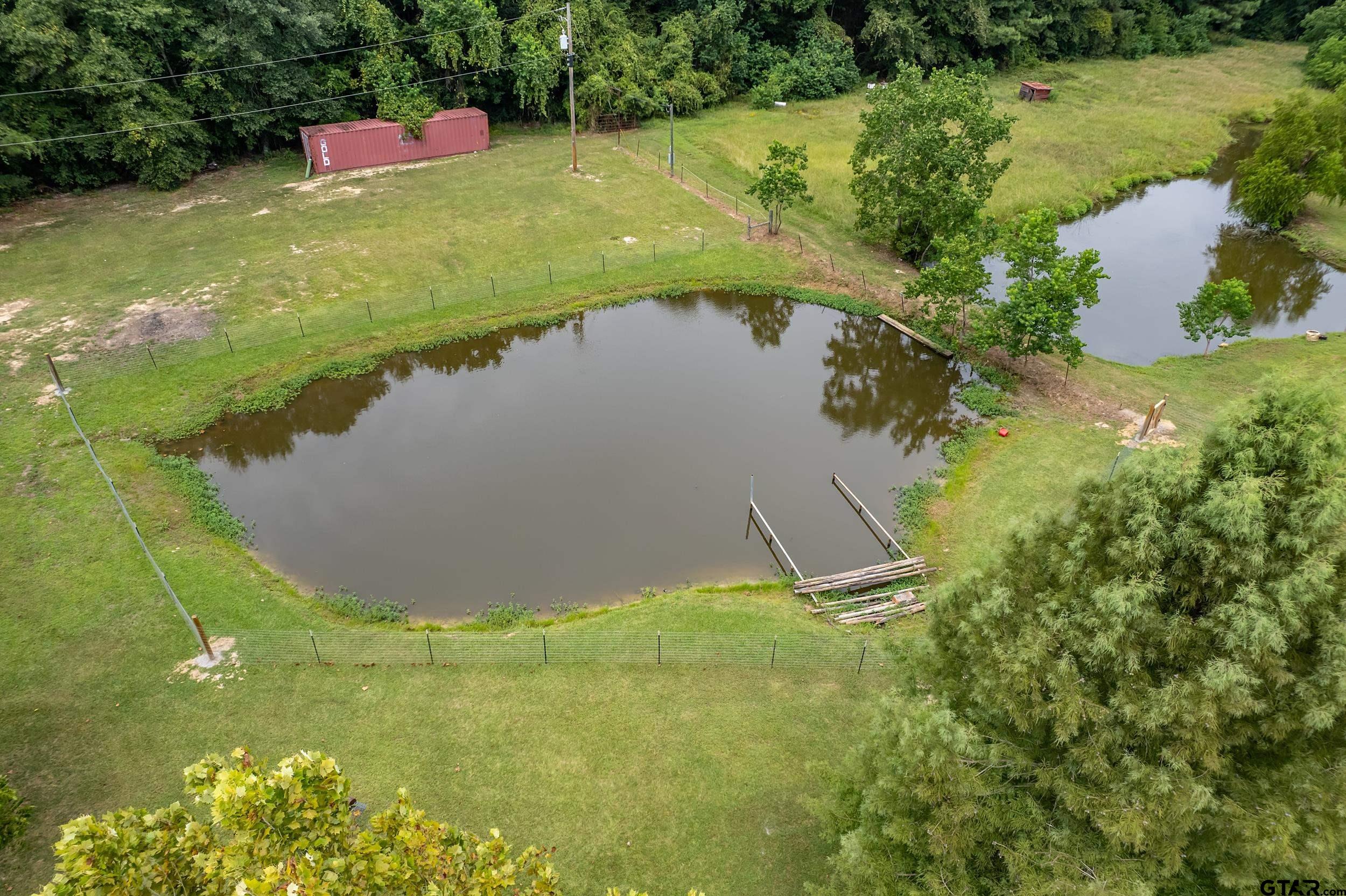 2888 Farm To Market Road 999 Gary, TX 75643 - Photo 39 of 46 an aerial view of a house