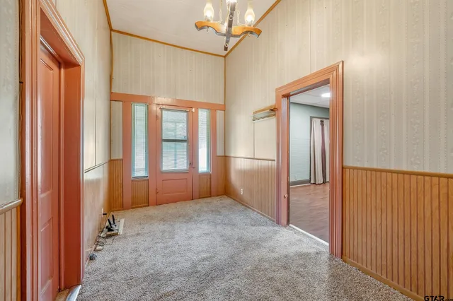 a view of entryway with a front door