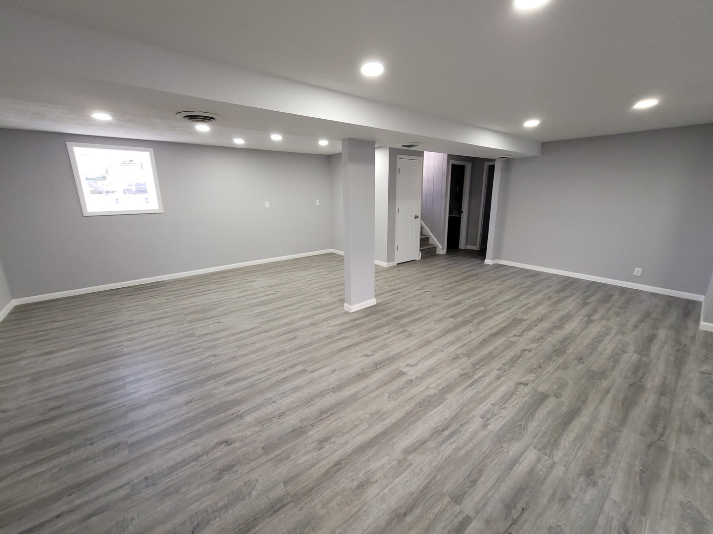 133 Kingston Road Bolingbrook, IL 60440 - Photo 15 of 19 a view of an empty room with wooden floor and a window