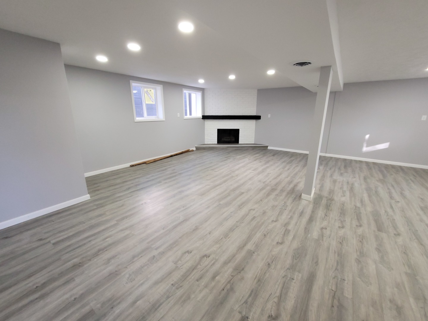 133 Kingston Road Bolingbrook, IL 60440 - Photo 16 of 19 a view of empty room with wooden floor and fireplace
