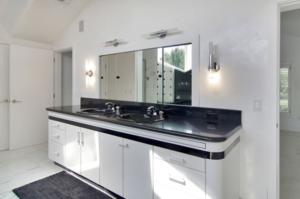 10 Patten Circle Newton, MA 02459 - Photo 13 of 26 a bathroom with a sink and a mirror