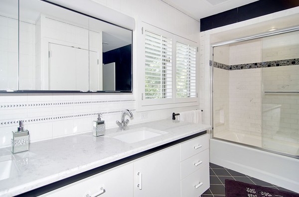 10 Patten Circle Newton, MA 02459 - Photo 15 of 26 a bathroom with a sink and a mirror