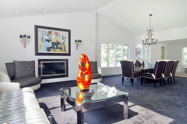 10 Patten Circle Newton, MA 02459 - Photo 5 of 26 a living room with furniture a chandelier and a fireplace