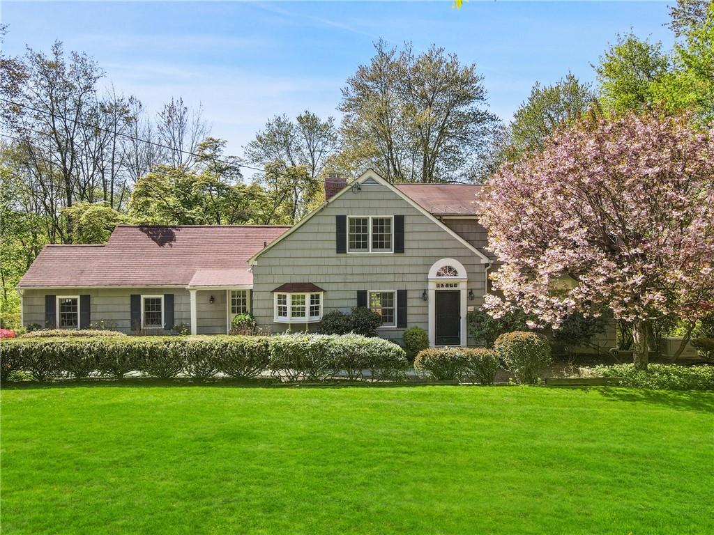 22 Devoe Road Chappaqua, NY 10514 - Photo 1 of 1 a front view of house with yard and green space