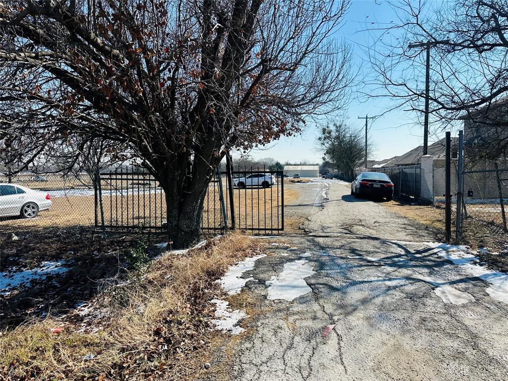 900 East Belt Line Road Wilmer, TX 75172 - Photo 6 of 11 a street view covered with snow