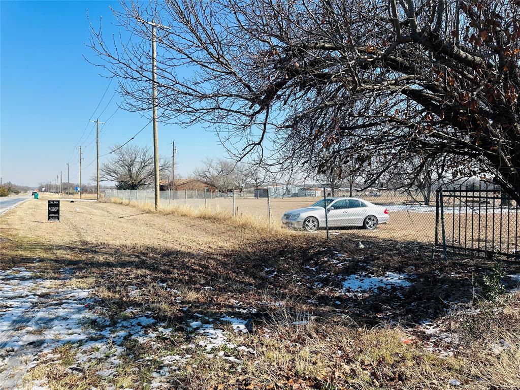 900 East Belt Line Road Wilmer, TX 75172 - Photo 7 of 11 a backyard of a house with a yard and outdoor seating
