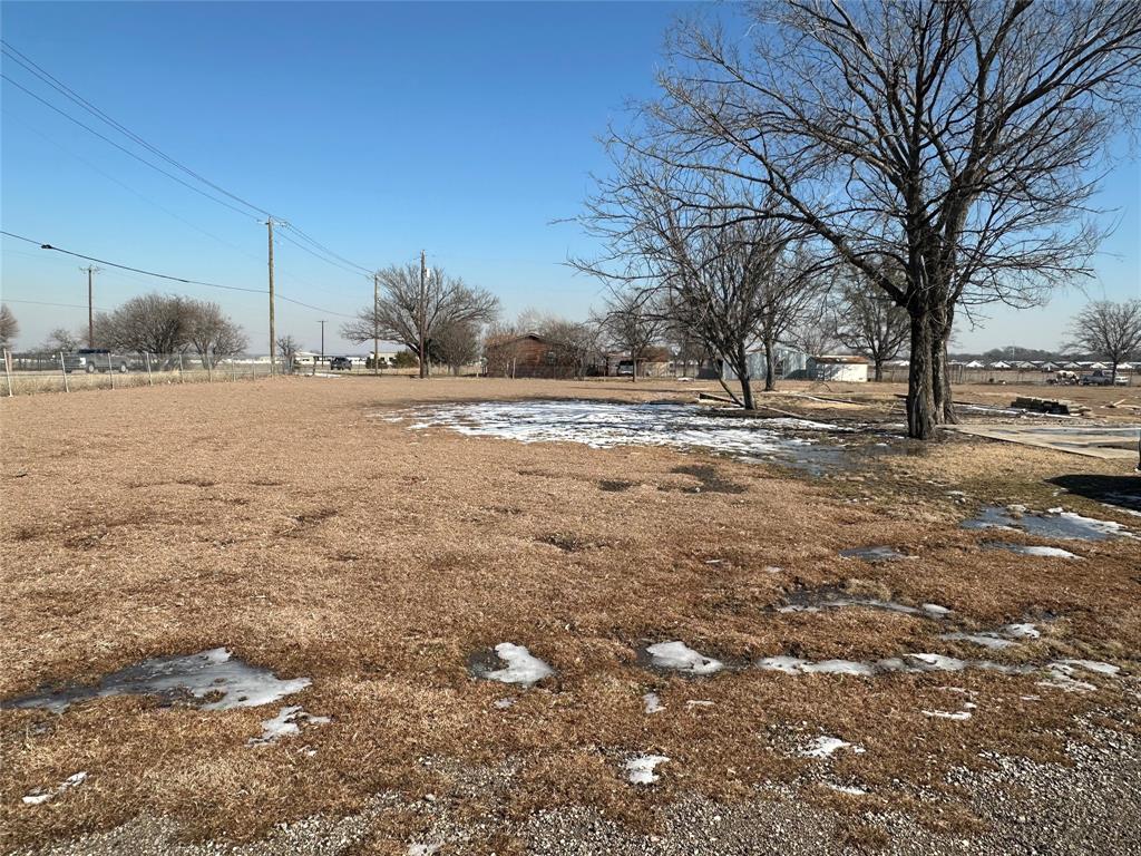 900 East Belt Line Road Wilmer, TX 75172 - Photo 10 of 11 a view of a yard with a tree