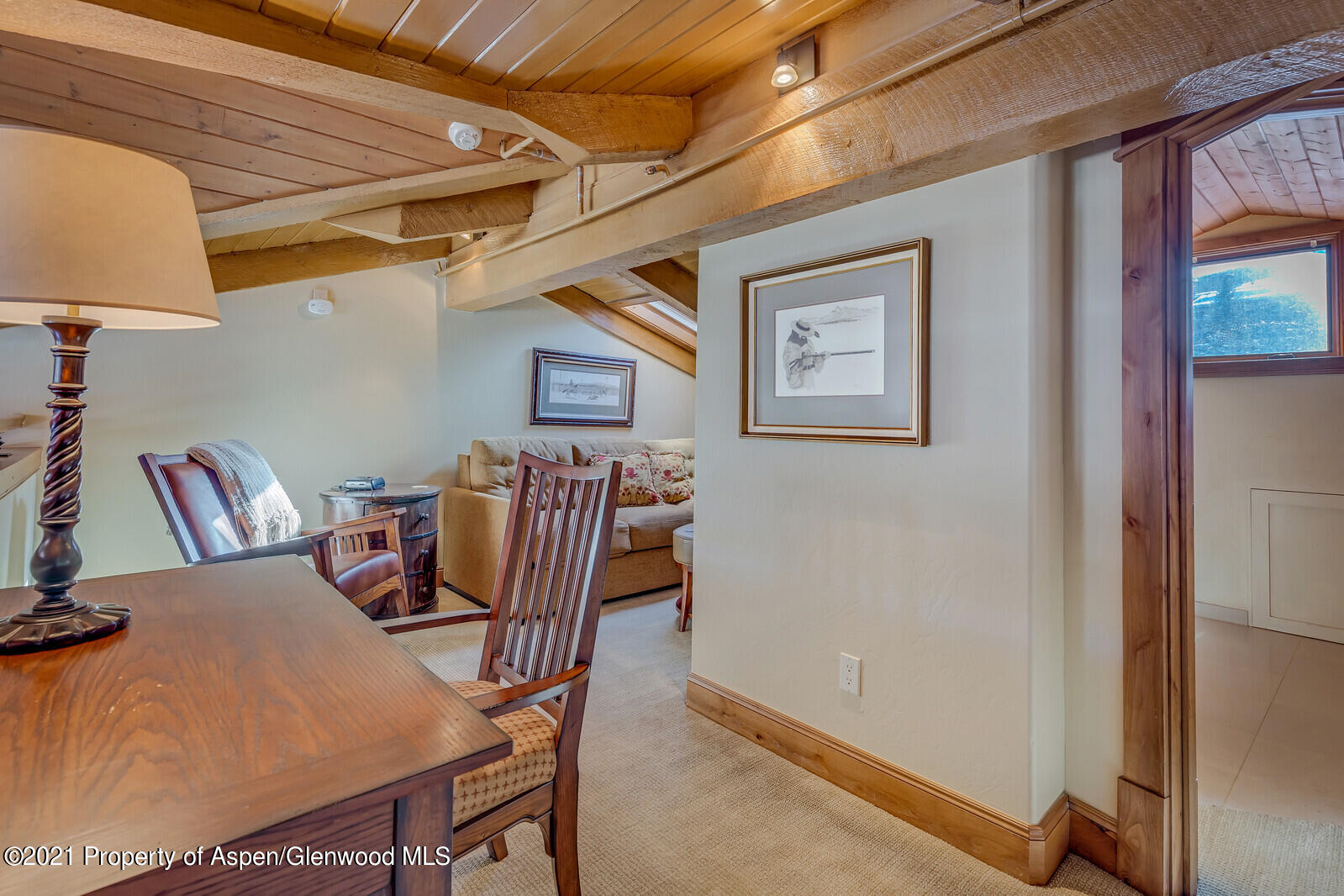 400 Wood Road, Unit 2302 Snowmass Village, CO 81615 - Photo 6 of 16 a view of a dining room with furniture