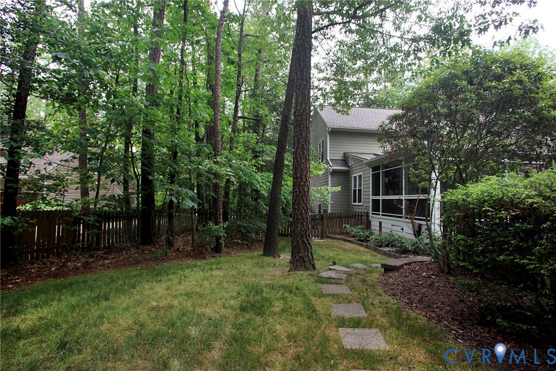 231 Hazelmere Drive Chesterfield, VA 23236 - Photo 30 of 33 a backyard of a house with lots of green space