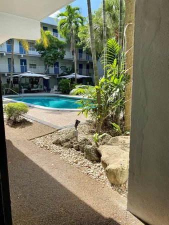 a view of a yard in front of a house