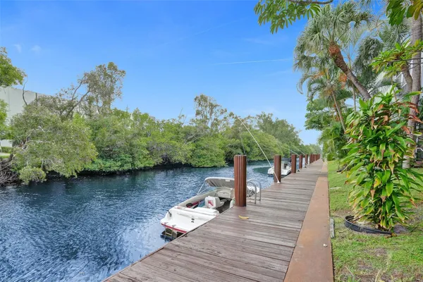 a view of a backyard with sitting area