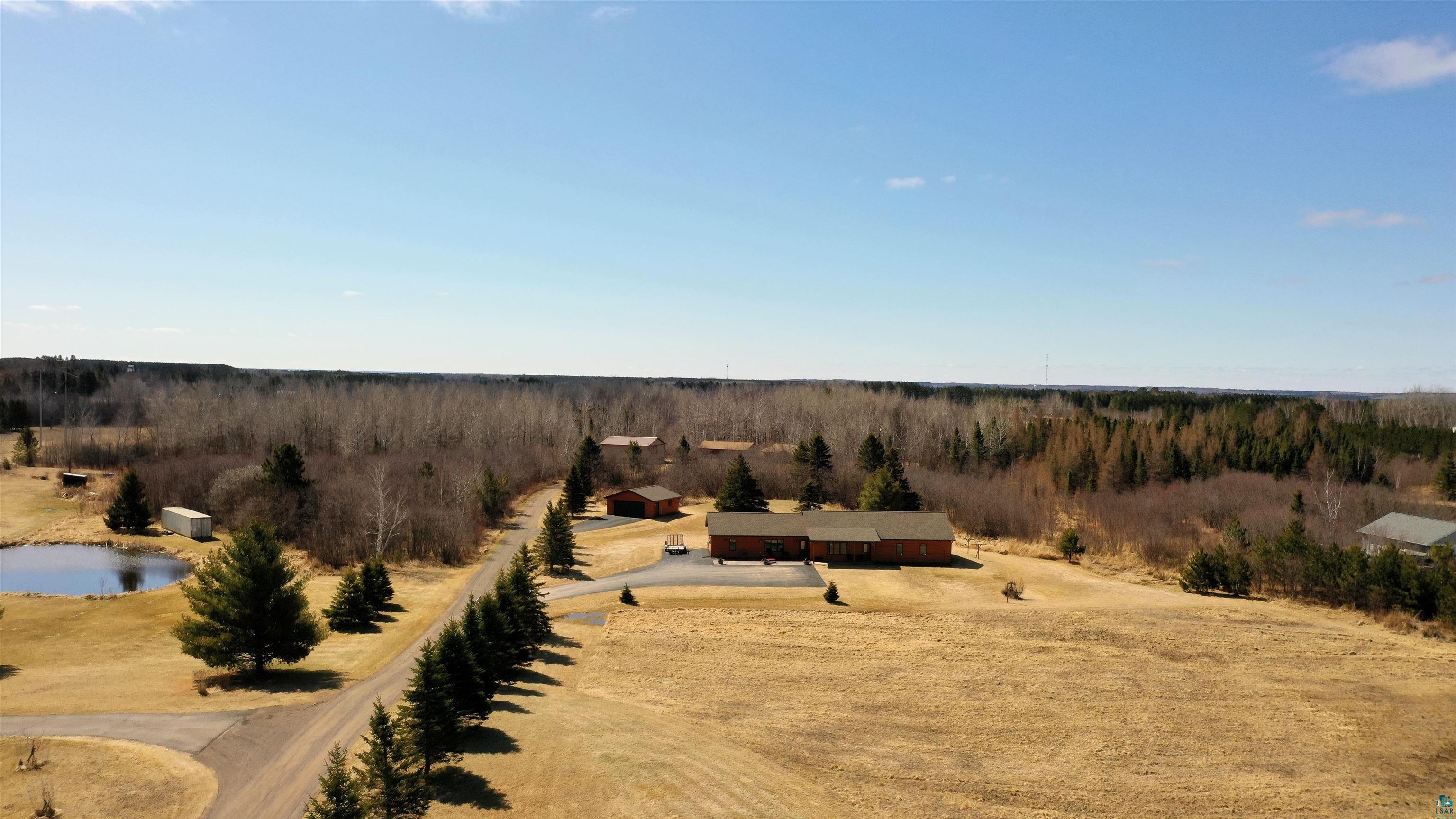 138 West Harney Road Esko, MN 55733 - Photo 29 of 50 Birds eye view of property with a rural view