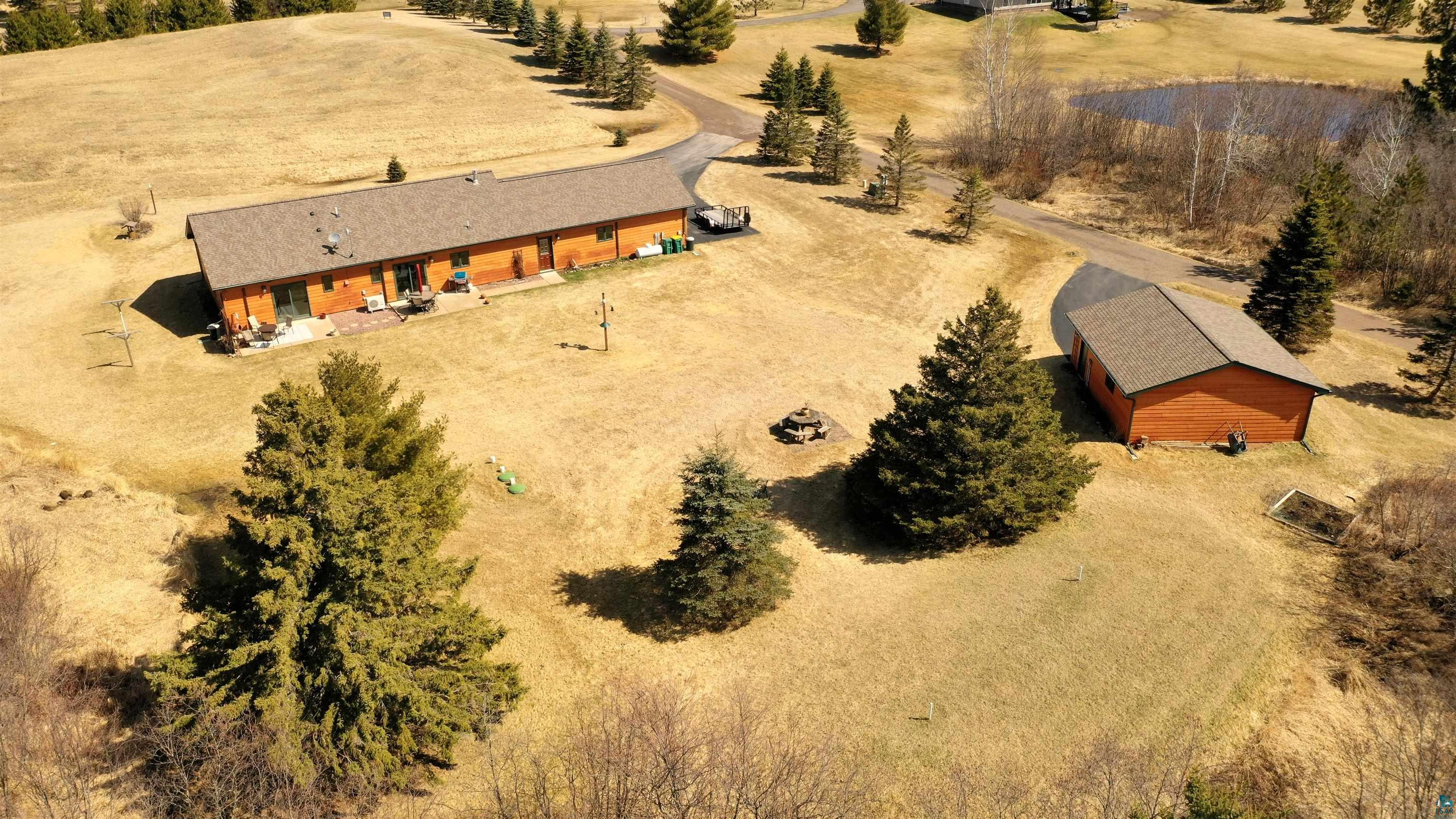 138 West Harney Road Esko, MN 55733 - Photo 50 of 50 Birds eye view of property featuring a rural view