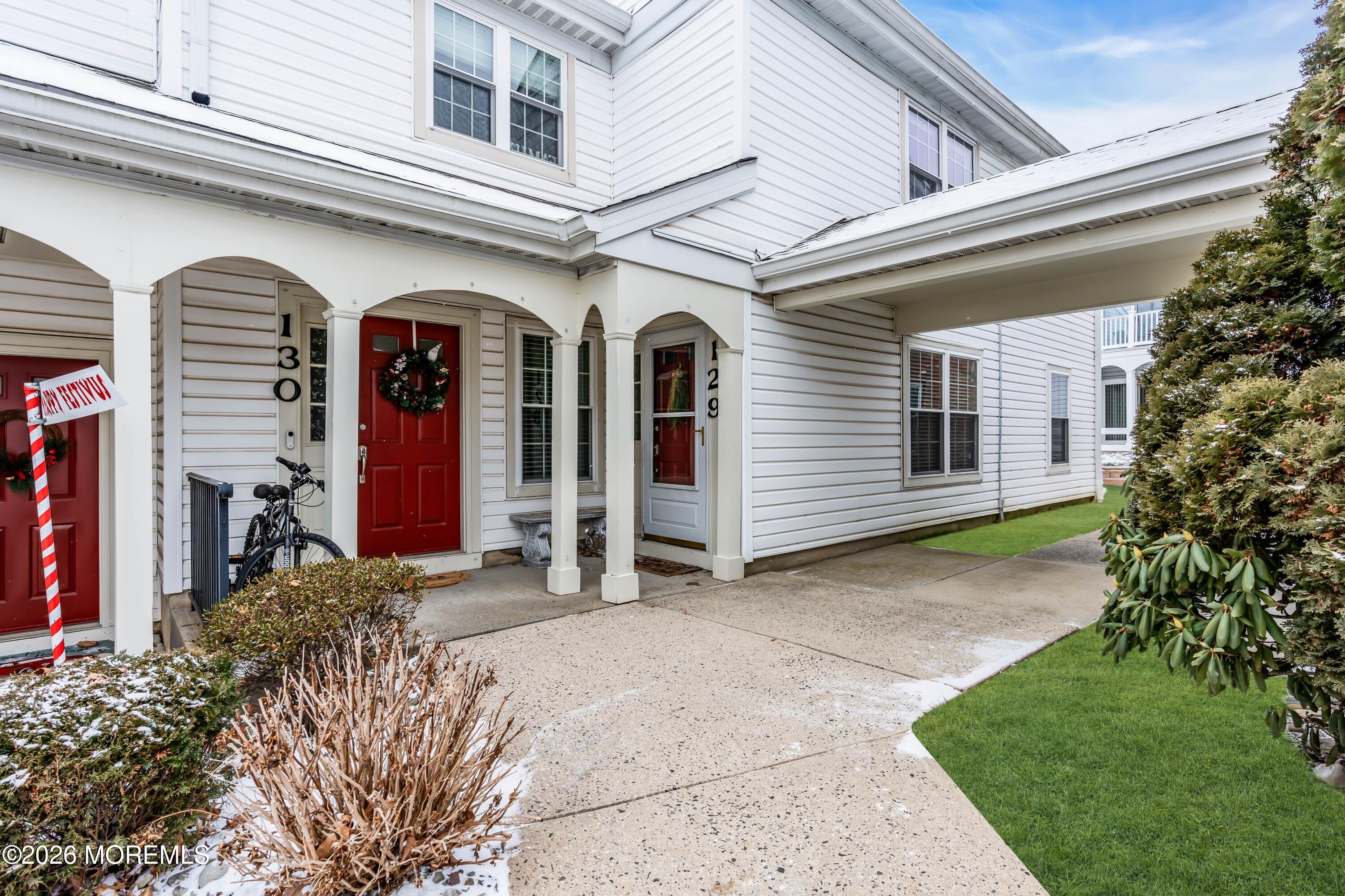 129 Tulip Lane Freehold, NJ 07728 - Photo 21 of 25 a view of a house with a yard