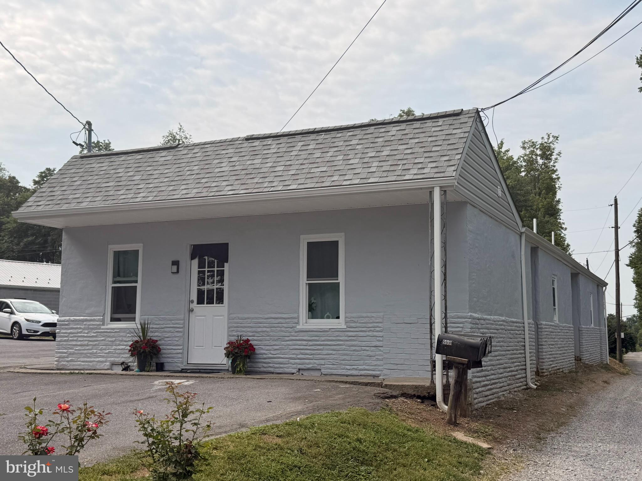 9947 Crossfield Road Hagerstown, MD 21740 - Photo 13 of 39 a view of a house with a patio