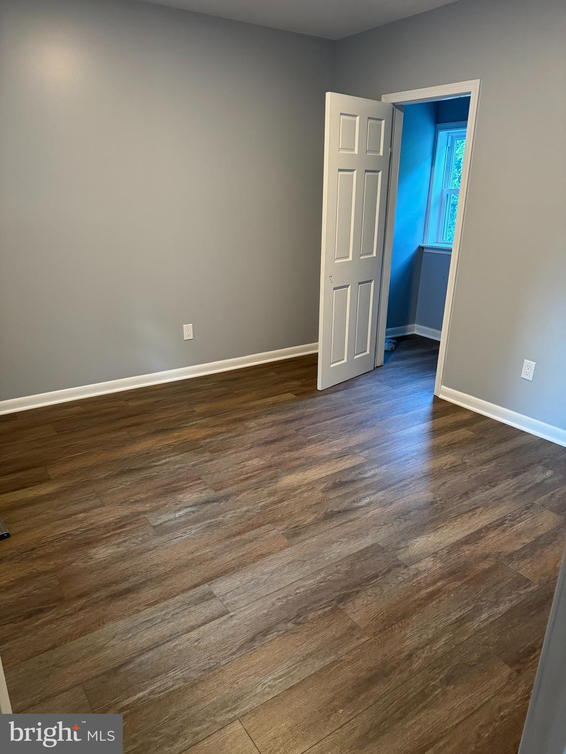 9947 Crossfield Road Hagerstown, MD 21740 - Photo 21 of 39 a view of an empty room with wooden floor and closet