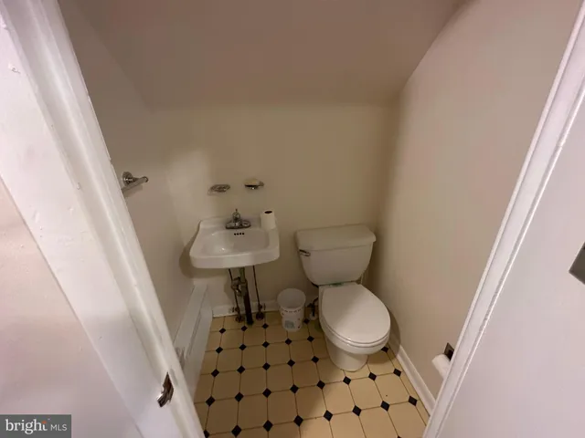 a kitchen with granite countertop lots of counter top space and furniture