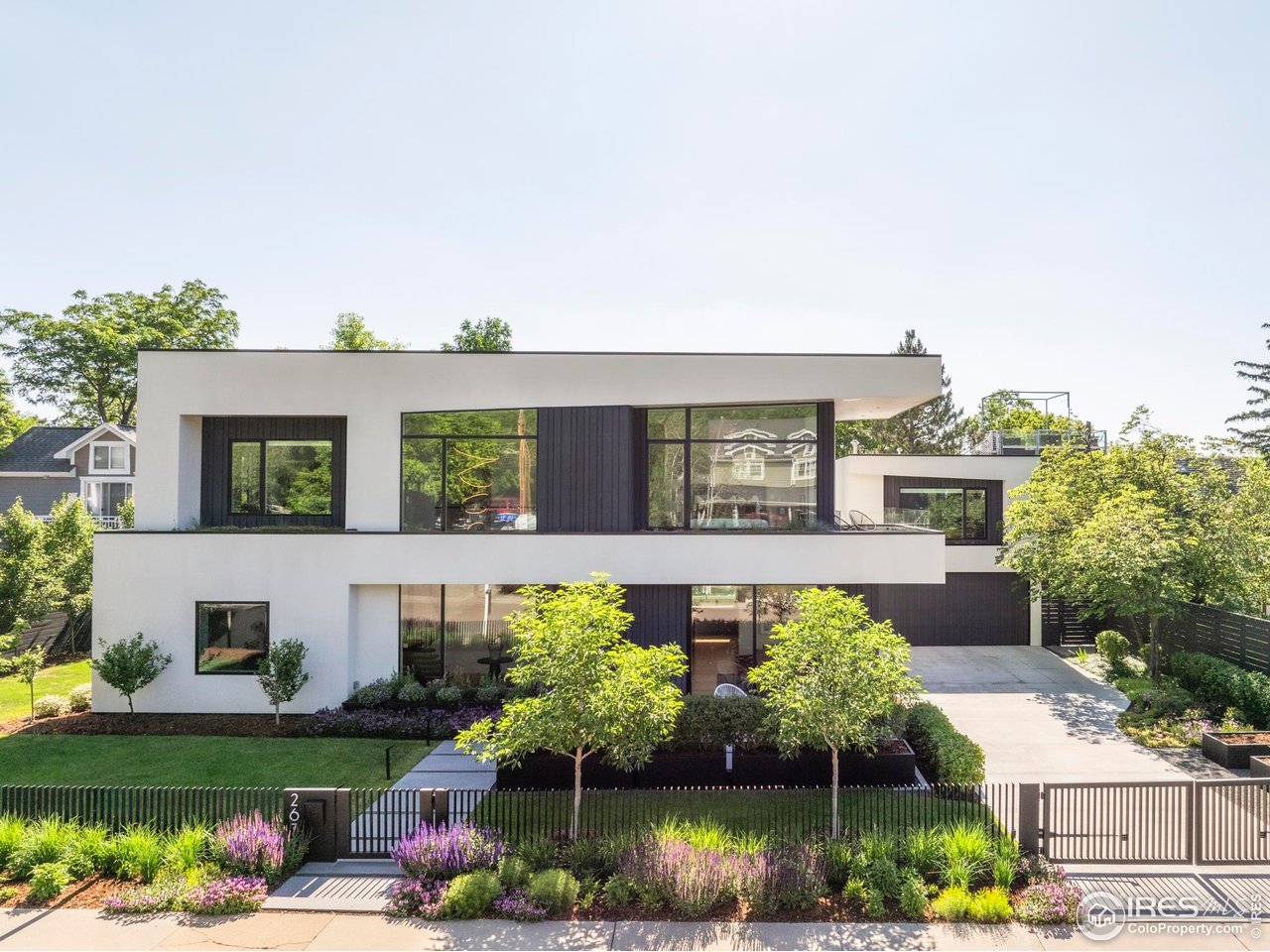 2670 6th Street Boulder, CO 80304 - Photo 1 of 30 front view of house with a yard and potted plants