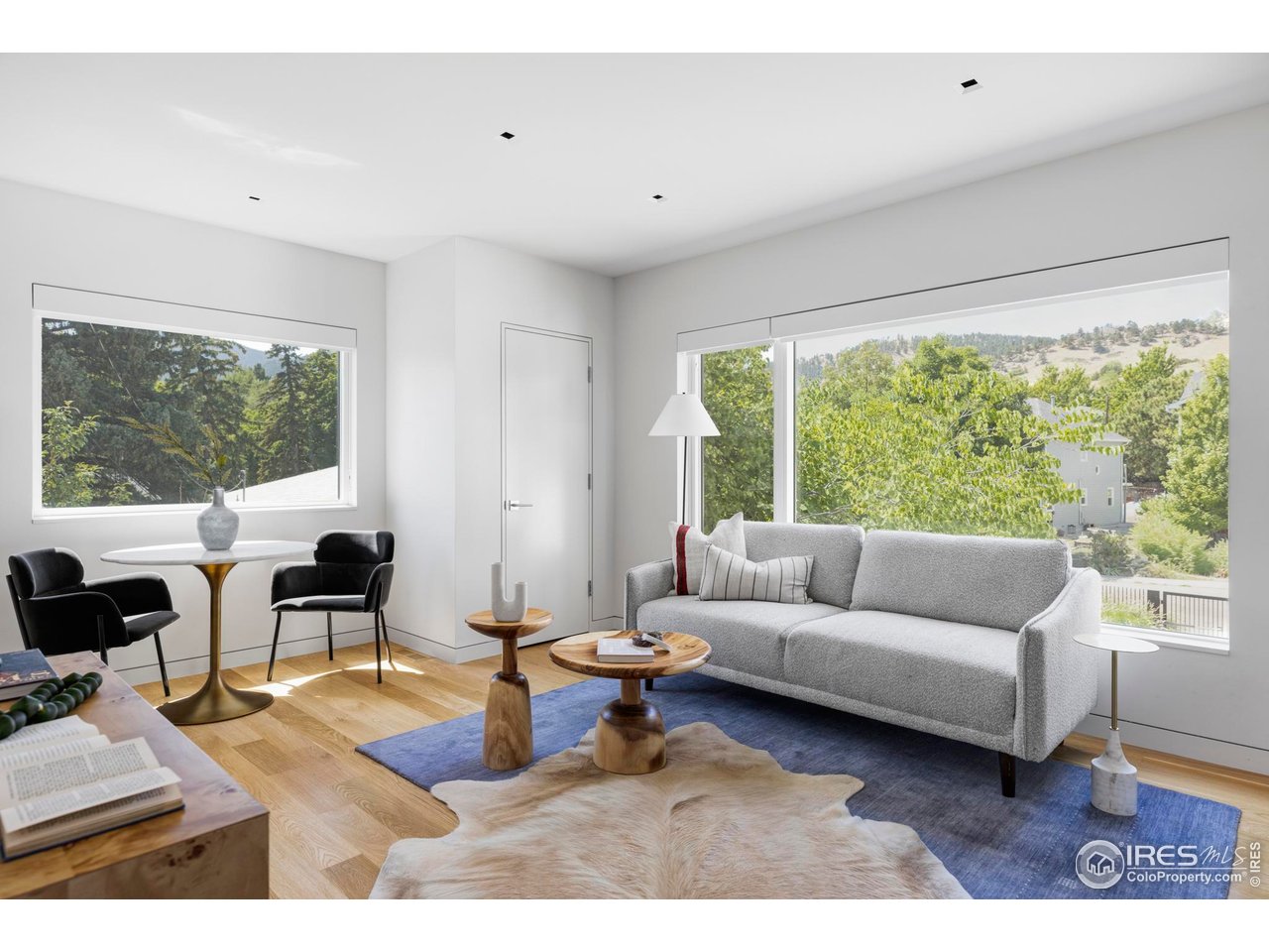 2670 6th Street Boulder, CO 80304 - Photo 24 of 30 a living room with furniture and large windows