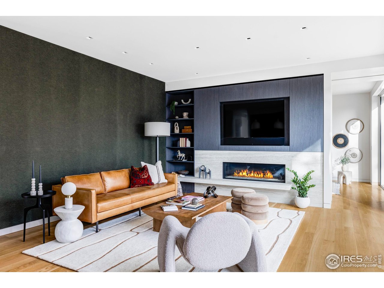2670 6th Street Boulder, CO 80304 - Photo 5 of 30 a living room with furniture and a flat screen tv