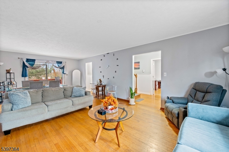 21 Laurie Road Landing, NJ 07850 - Photo 3 of 14 a living room with furniture and a flat screen tv