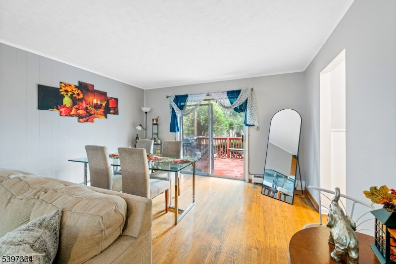 21 Laurie Road Landing, NJ 07850 - Photo 6 of 14 a bedroom with furniture and a flat screen tv