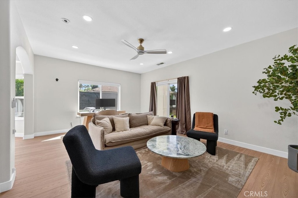 1555 Taylor Street Madera, CA 93637 - Photo 34 of 75 a living room with furniture a table and a potted plant