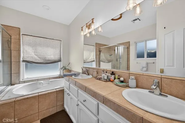 a view of a backyard with a sitting area