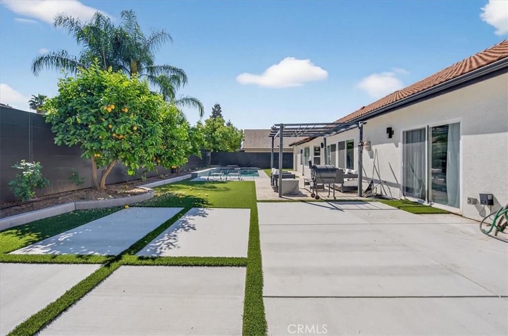 1555 Taylor Street Madera, CA 93637 - Photo 69 of 75 a view of a swimming pool with a patio