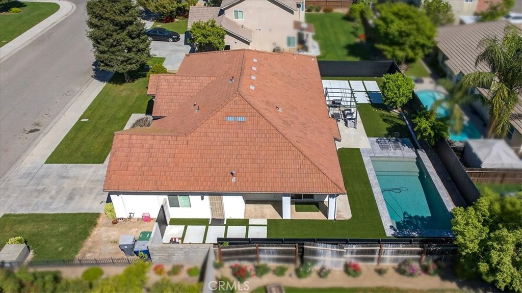 1555 Taylor Street Madera, CA 93637 - Photo 74 of 75 an aerial view of a house with a yard
