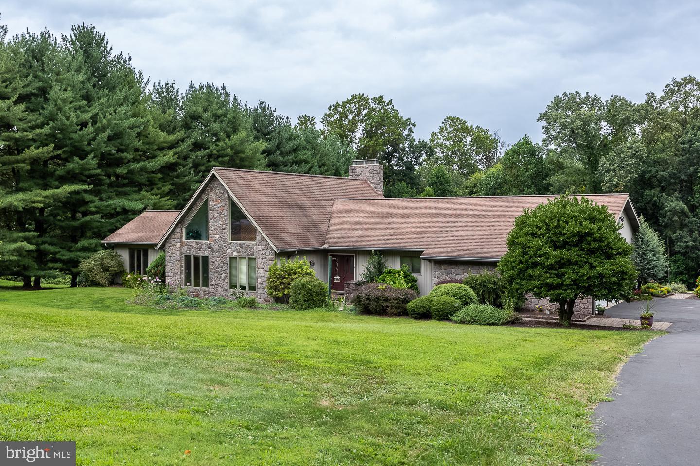 a house view with a garden space