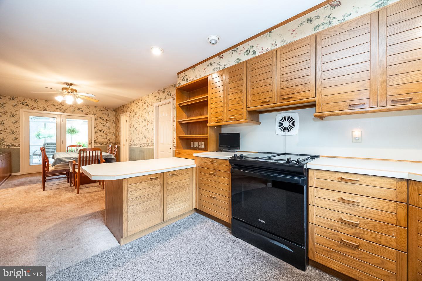 841 Cadmus Road Pottstown, PA 19465 - Photo 20 of 58 a kitchen with stainless steel appliances granite countertop a stove and a sink