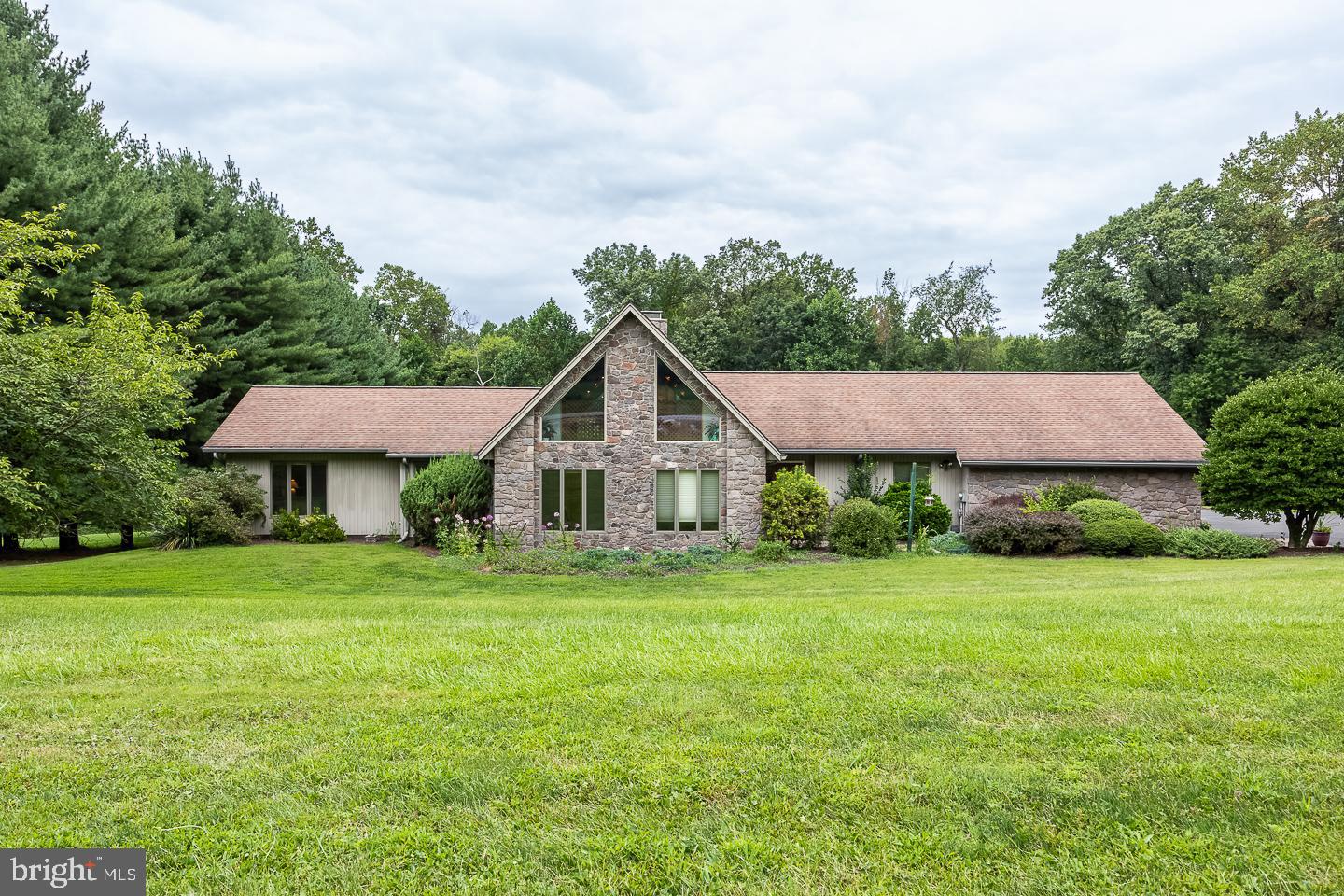 841 Cadmus Road Pottstown, PA 19465 - Photo 2 of 58 a house view with a garden space