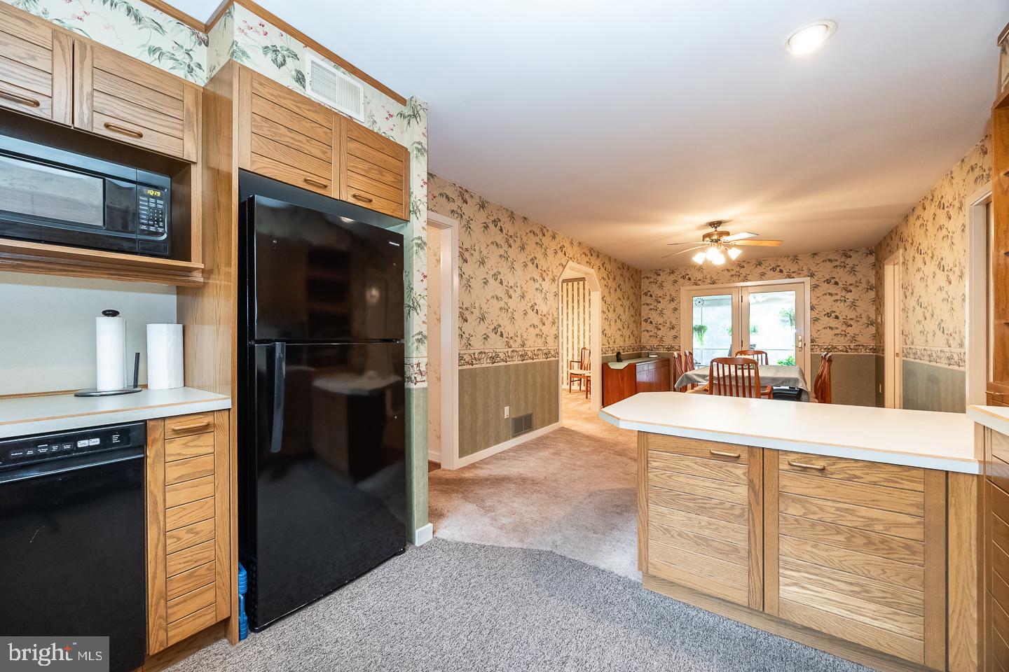 841 Cadmus Road Pottstown, PA 19465 - Photo 21 of 58 a large kitchen with cabinets and a stove
