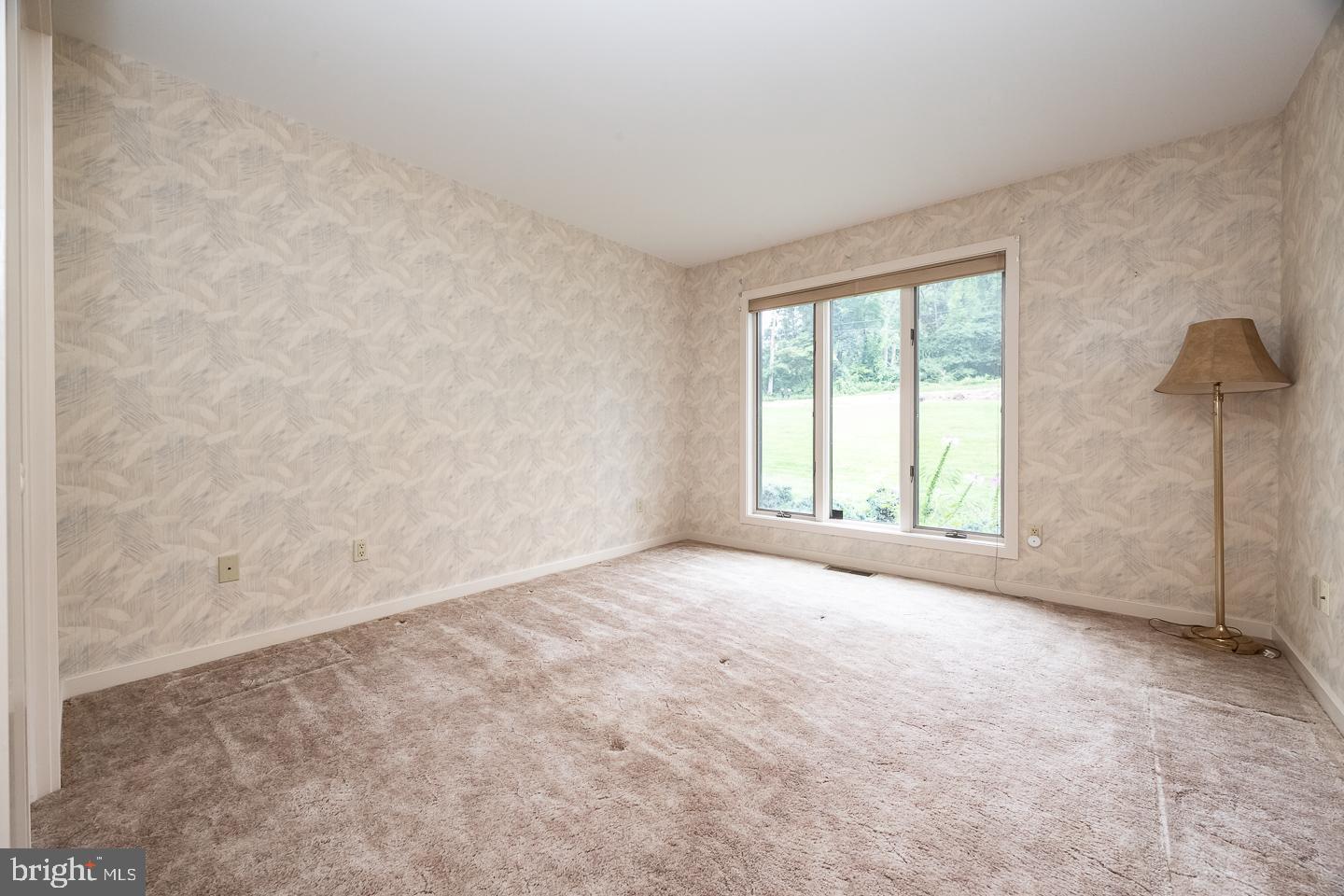 841 Cadmus Road Pottstown, PA 19465 - Photo 35 of 58 an empty room with windows