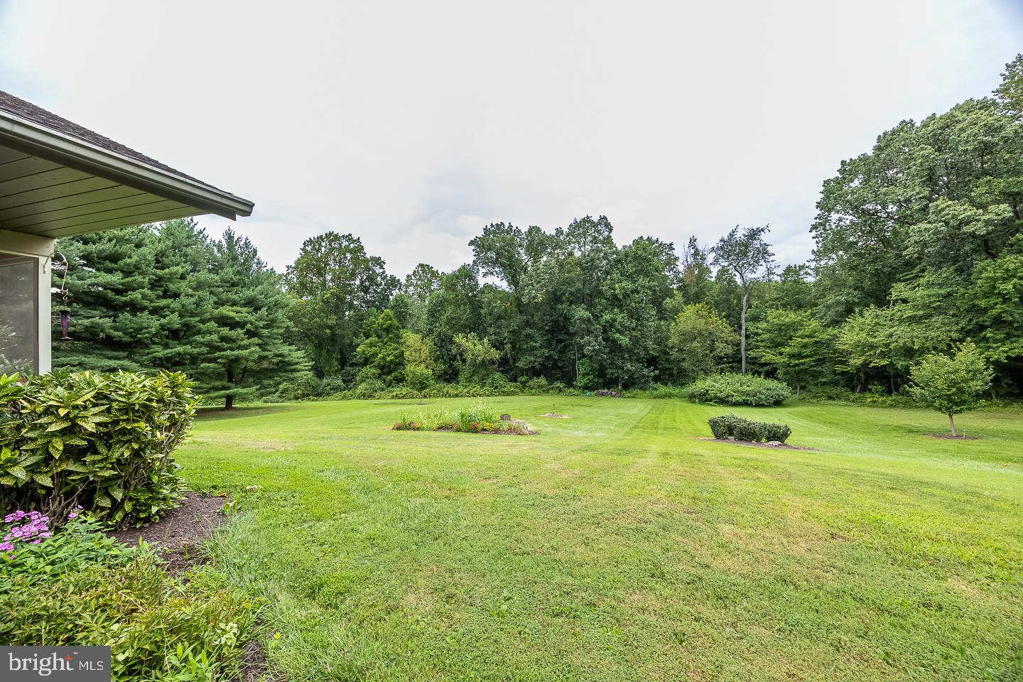 841 Cadmus Road Pottstown, PA 19465 - Photo 46 of 58 a backyard of a house with a yard and outdoor seating
