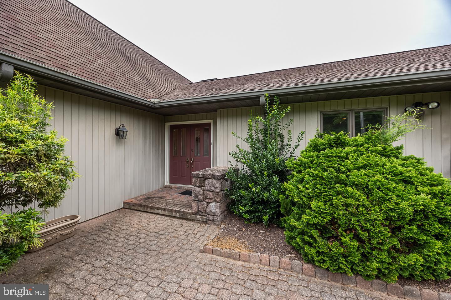 841 Cadmus Road Pottstown, PA 19465 - Photo 5 of 58 a front view of a house with garden