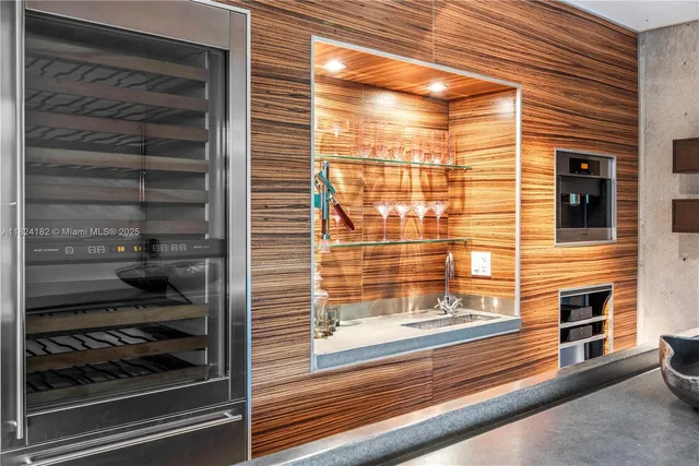 a kitchen with granite countertop a stove and cabinets